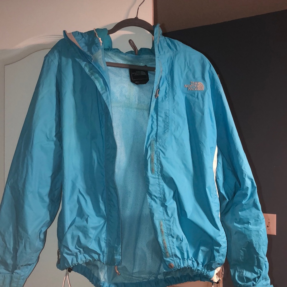 Blue women’s North Face XL rain jacket